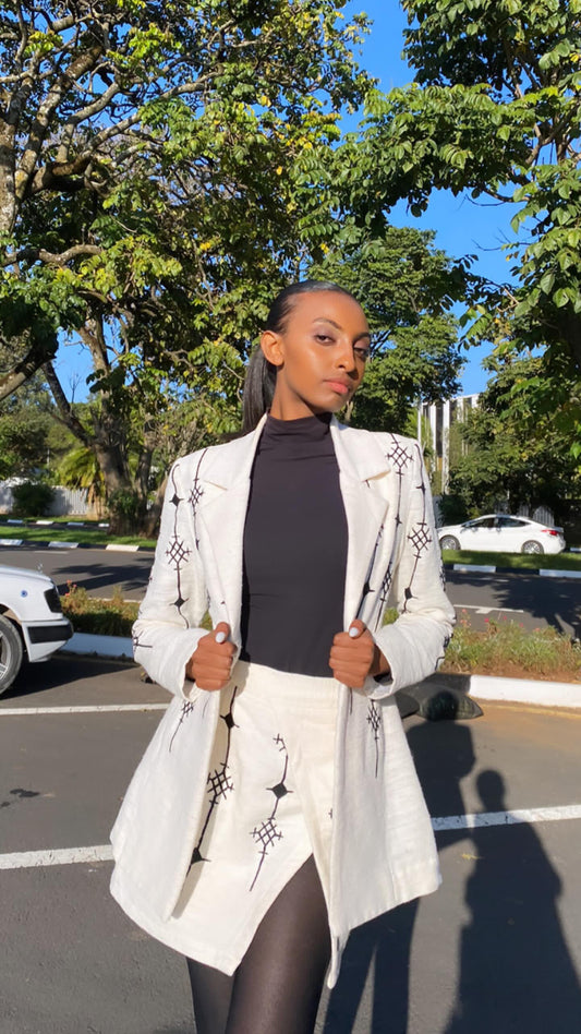 Ethiopian Elegance: Handwoven Habesha Coat & Skirts with Black Cross Embroidery