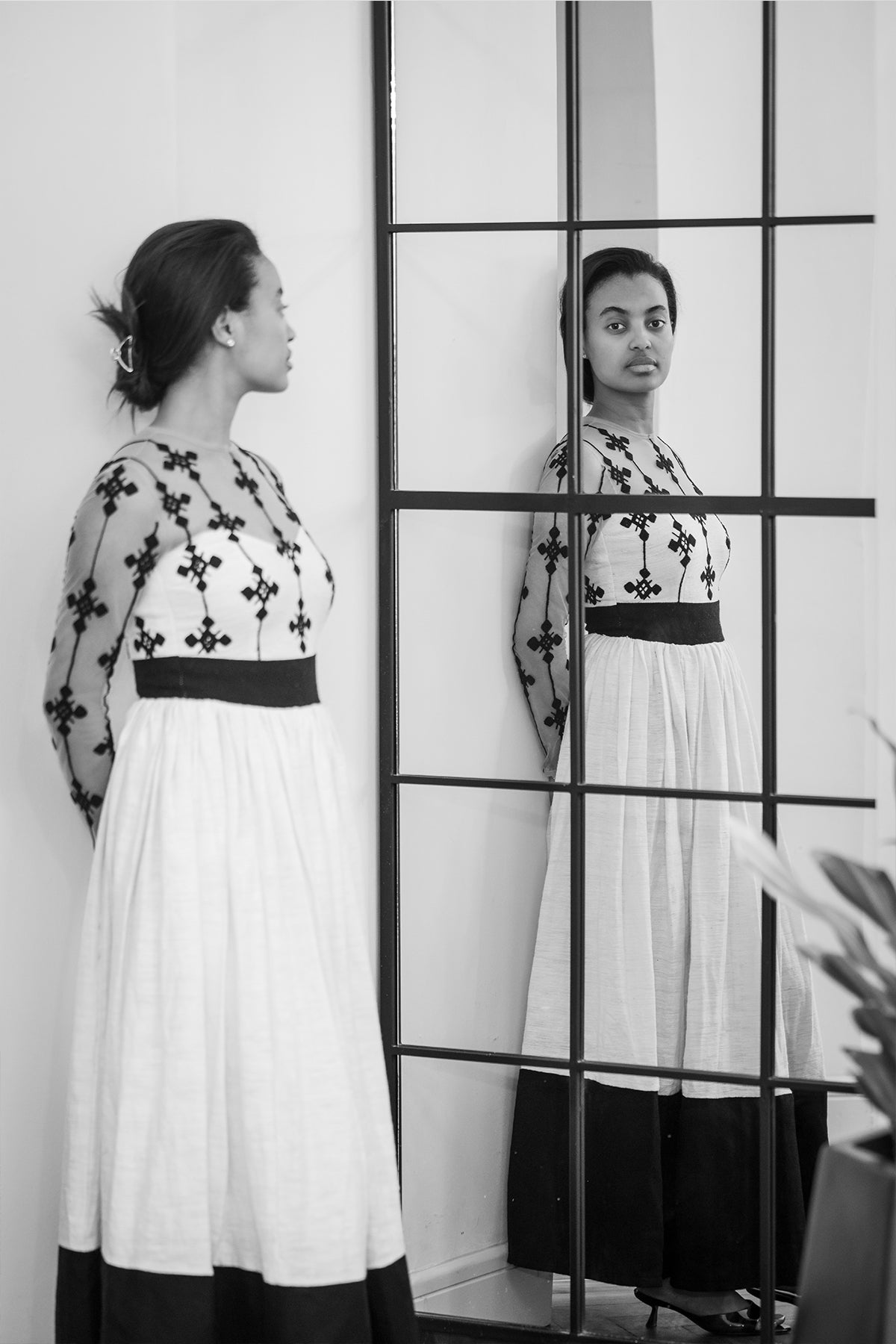 Wubsira [ውብስራ] : Black-Themed Embroidery Habseha Dress